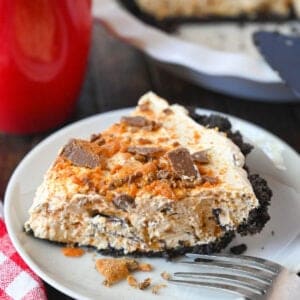 Slice of butterfinger pie on a plate.