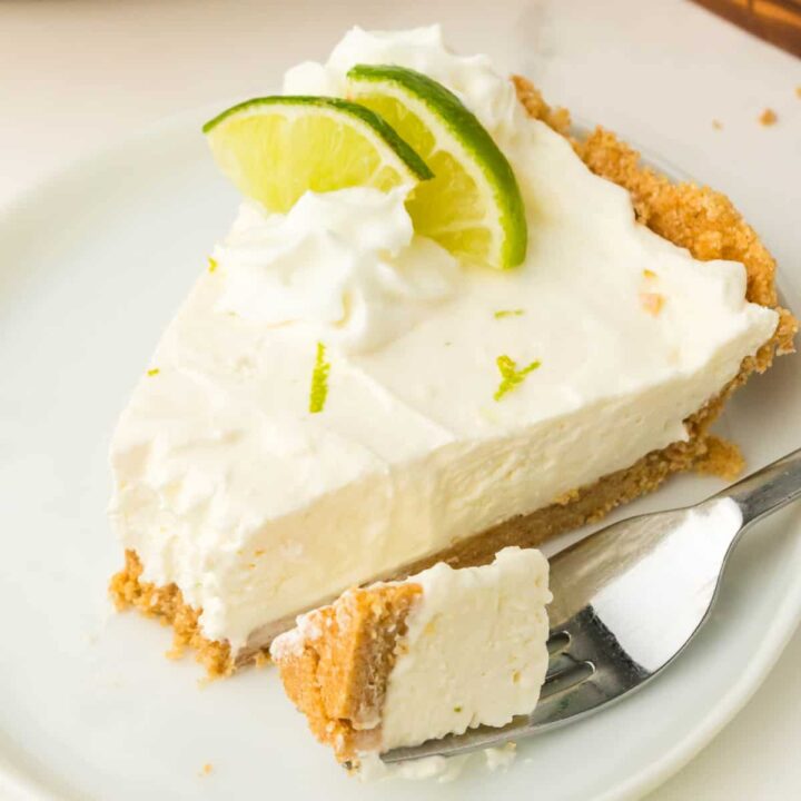 A slice of pie with a bite on a fork.