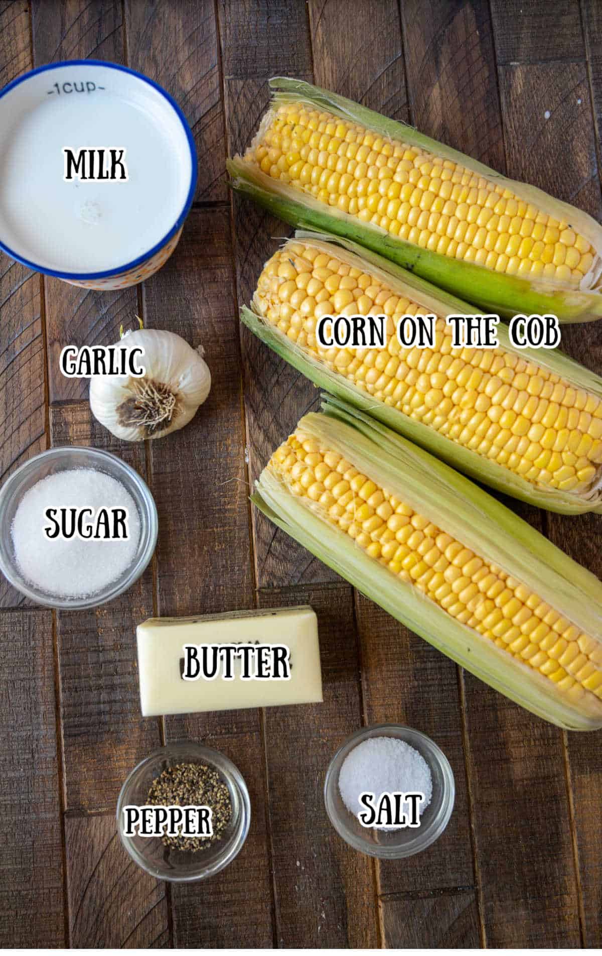 All the ingredients needed for milk boiled corn on the cob.