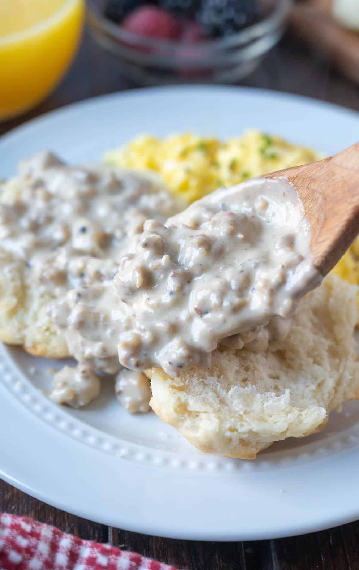 Sausage gravy spooned on top of a biscuit.