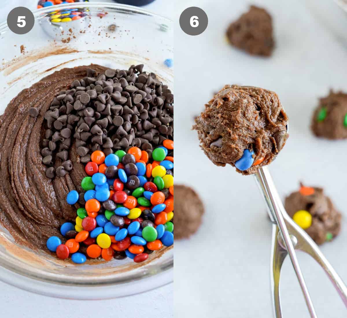 Cookie dough in a bowl with chocolat chips and M&M's folded in and a cookie scoop picking some up.