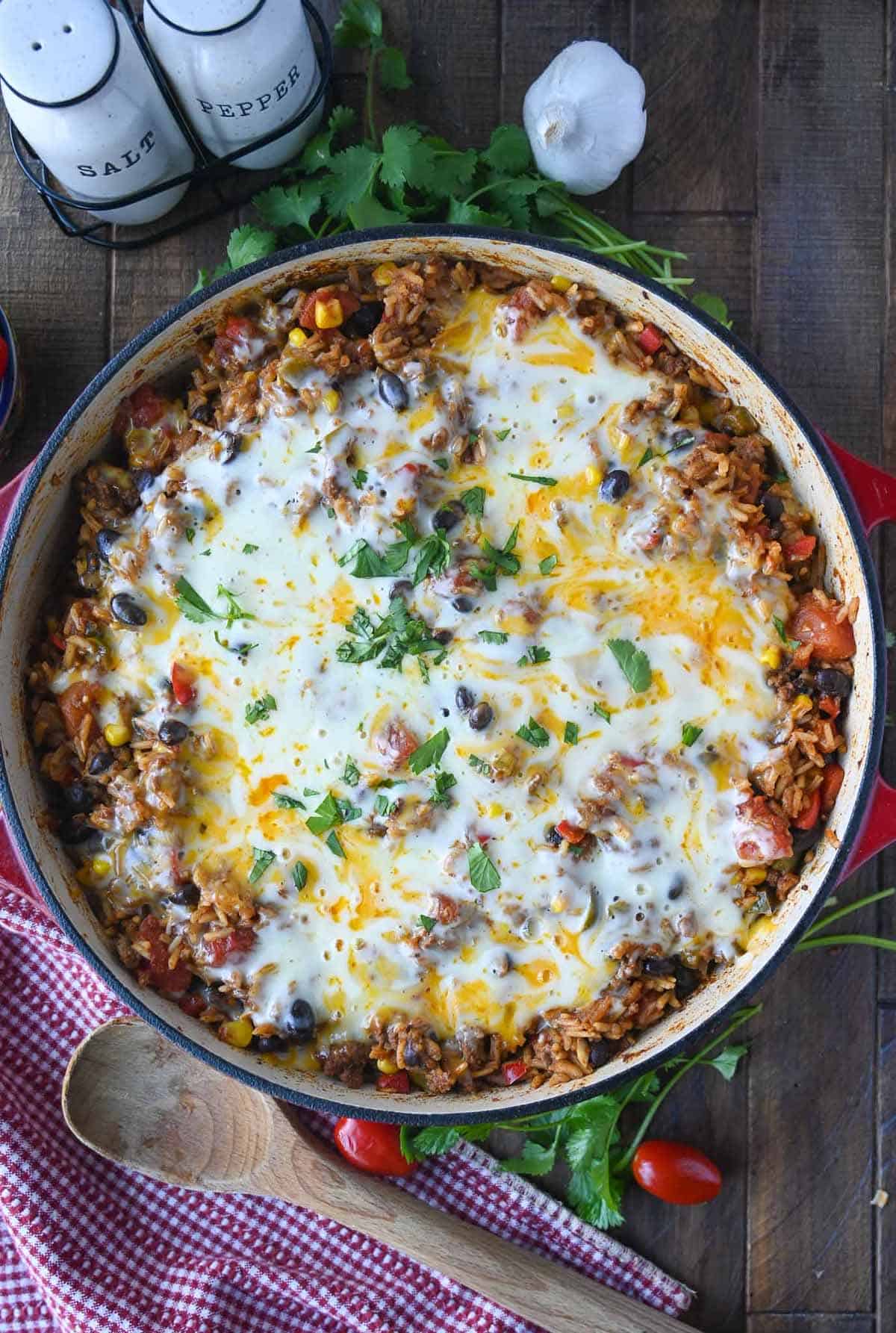 Mexican rice casserole in a red skillet.