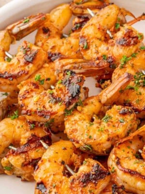 Texas roadhouse shrimp skewers on a plate.