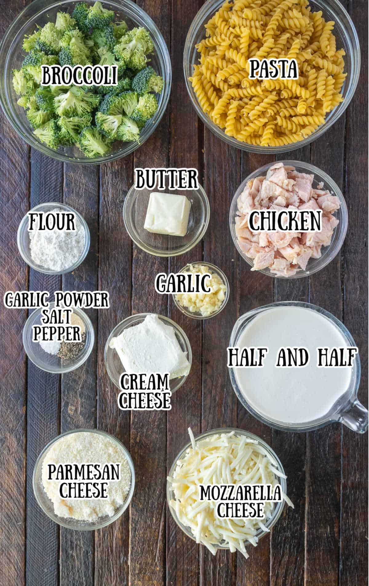 Ingredients for chicken and broccoli alfredo bake on a counter.
