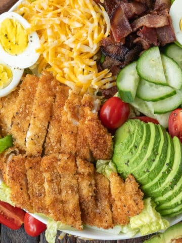 Crispy chicken salad in a large bowl.