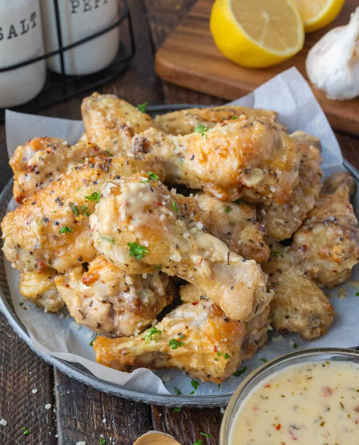 A plate of garlic parmesan chicken wings.