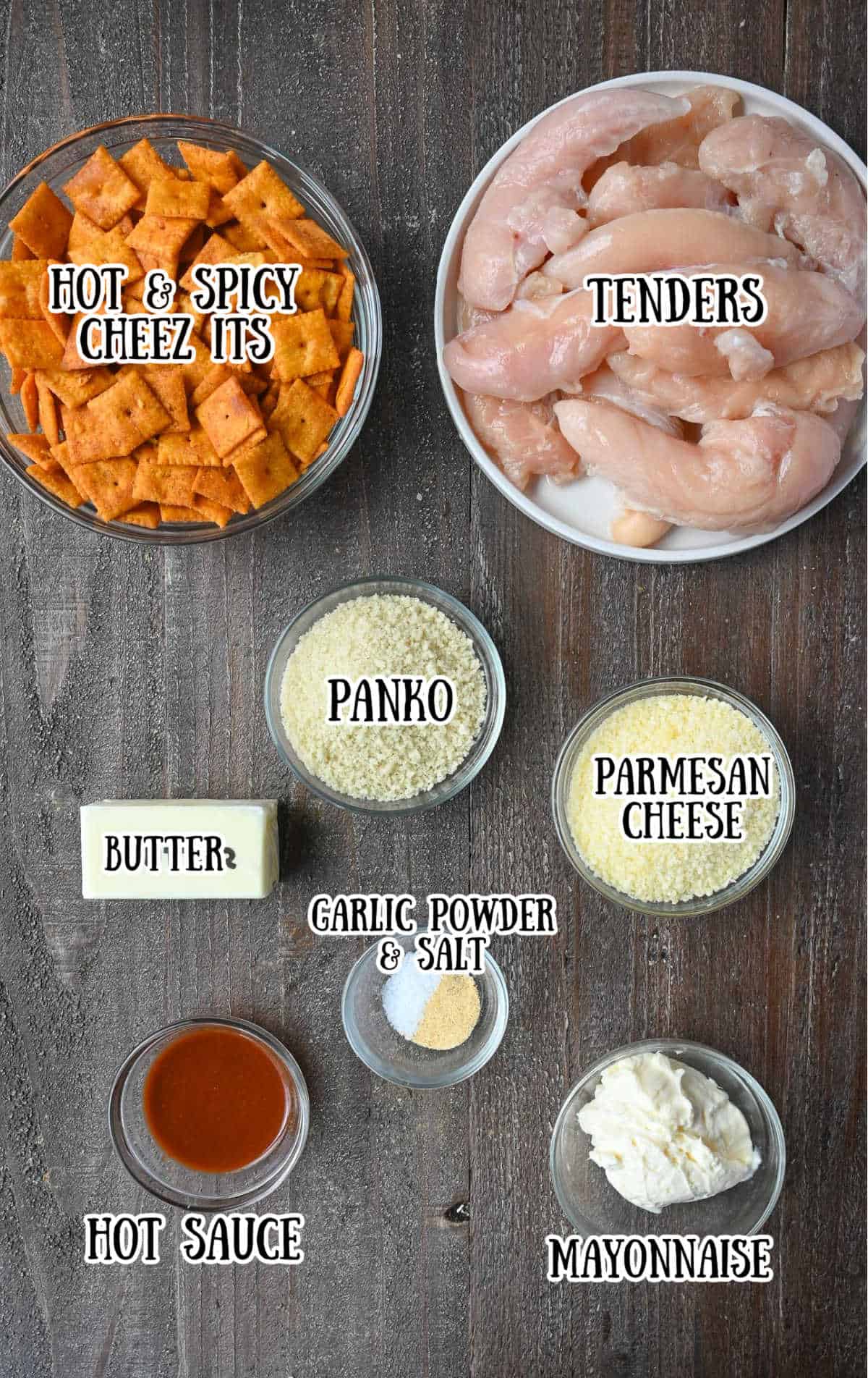 Labelled ingredients for buffalo chicken tenders on a wooden countertop.