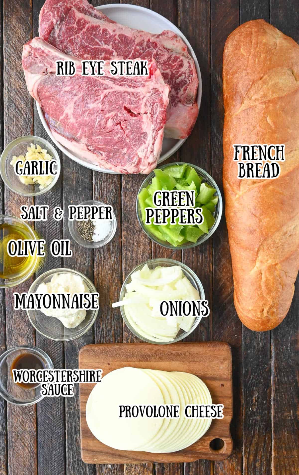All the ingredients needed for philly cheesesteak french bread pizza.