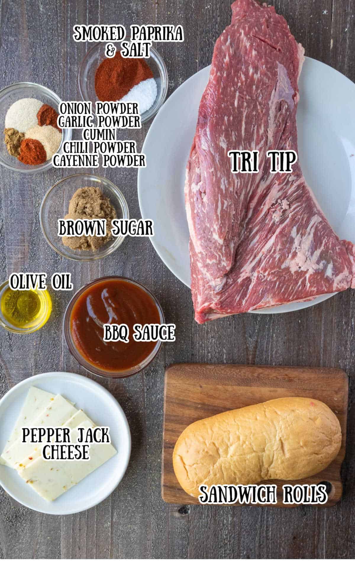 Labelled ingredients for grilled tri tip sandwiches on a counter.