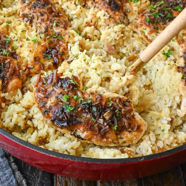 Close up of chicken and rice casserole in a pot.