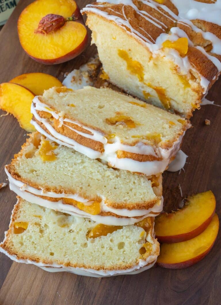 Peach cake cut into slices.