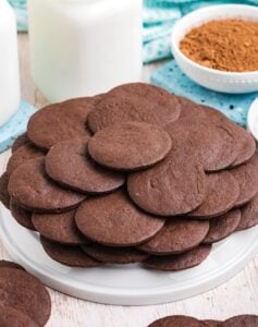 A plate of carefully arranged chocolate wafers.