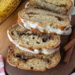Several slices of cinnamon swirl banana bread leaning on each other.