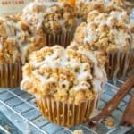 Pumpkin streusel muffins on a cooling rack.