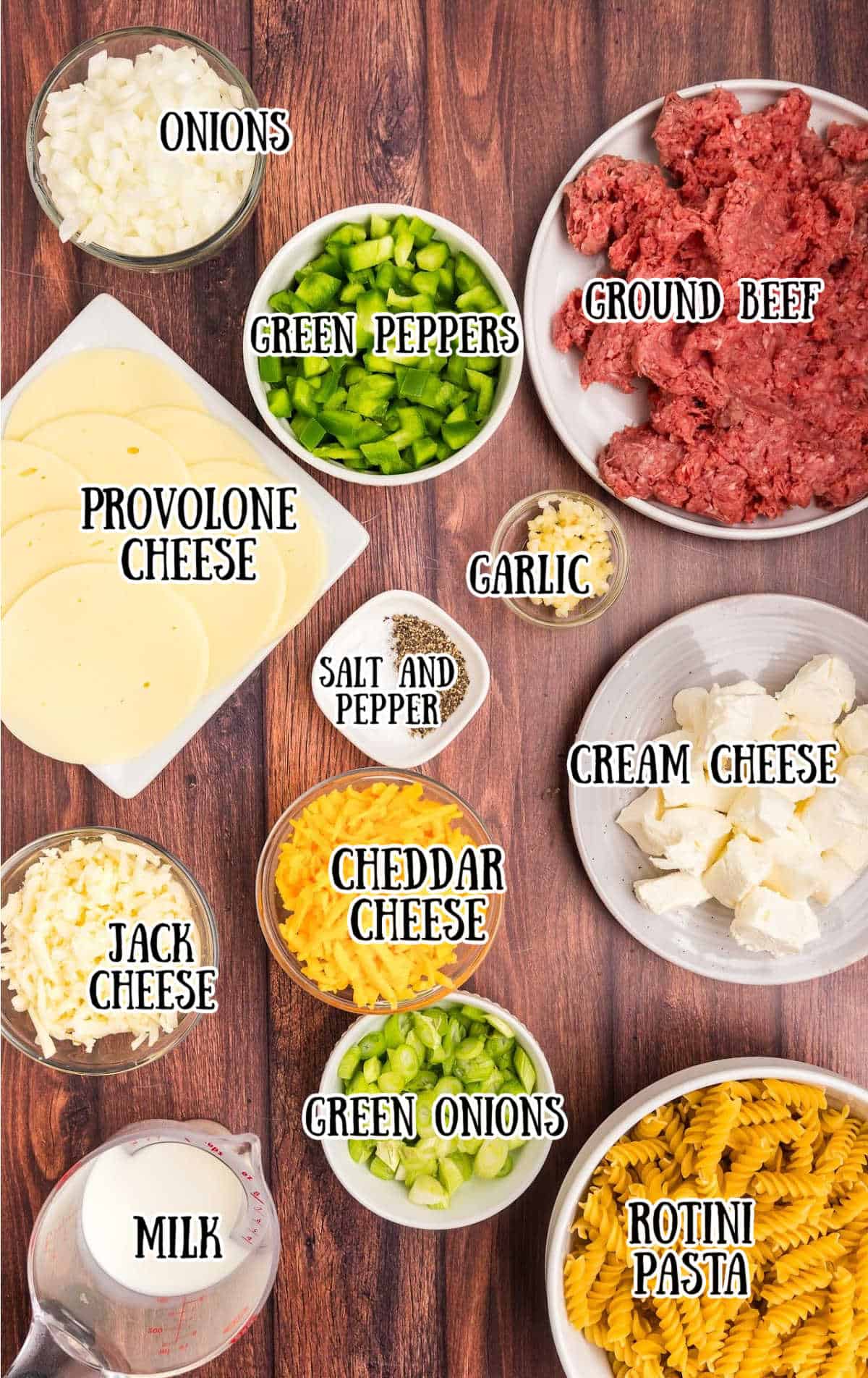 Labeled ingredients for philly cheesesteak pasta casserole.