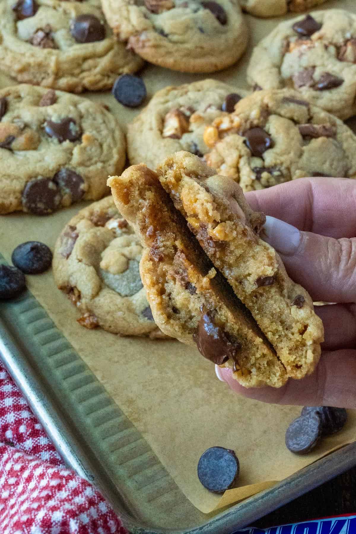 A snickers cookies broken in half.