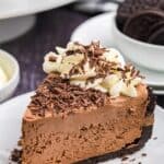 A piece of baileys cheesecake on a plate.