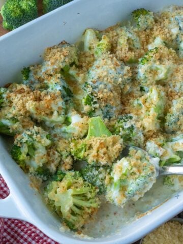 Close up view of a casserole dish with broccoli cheese bake.