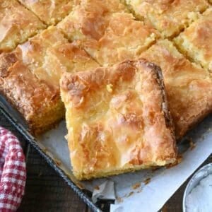 Butter cake bars on a baking sheet.