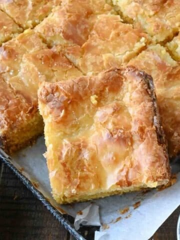 Butter cake bars on a baking sheet.