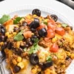 Pinterest graphic featuring beef enchilada skillet.