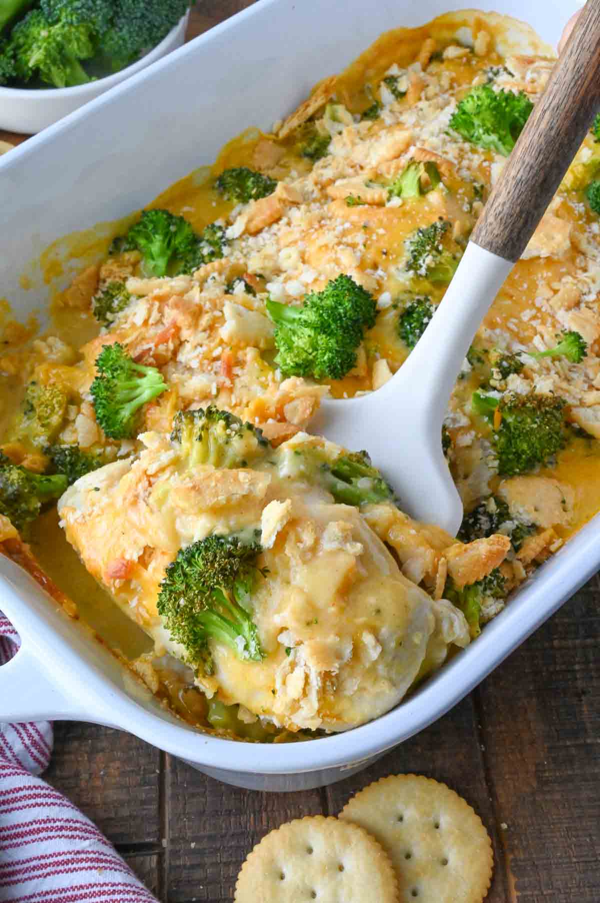 A baking dish full of copycat cracker barrel broccoli cheddar chicken.