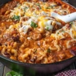 Homade chili mac on a cast iron skillet.