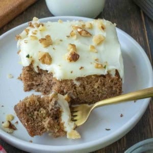 Close up of a slice of zucchini cake on a plate.