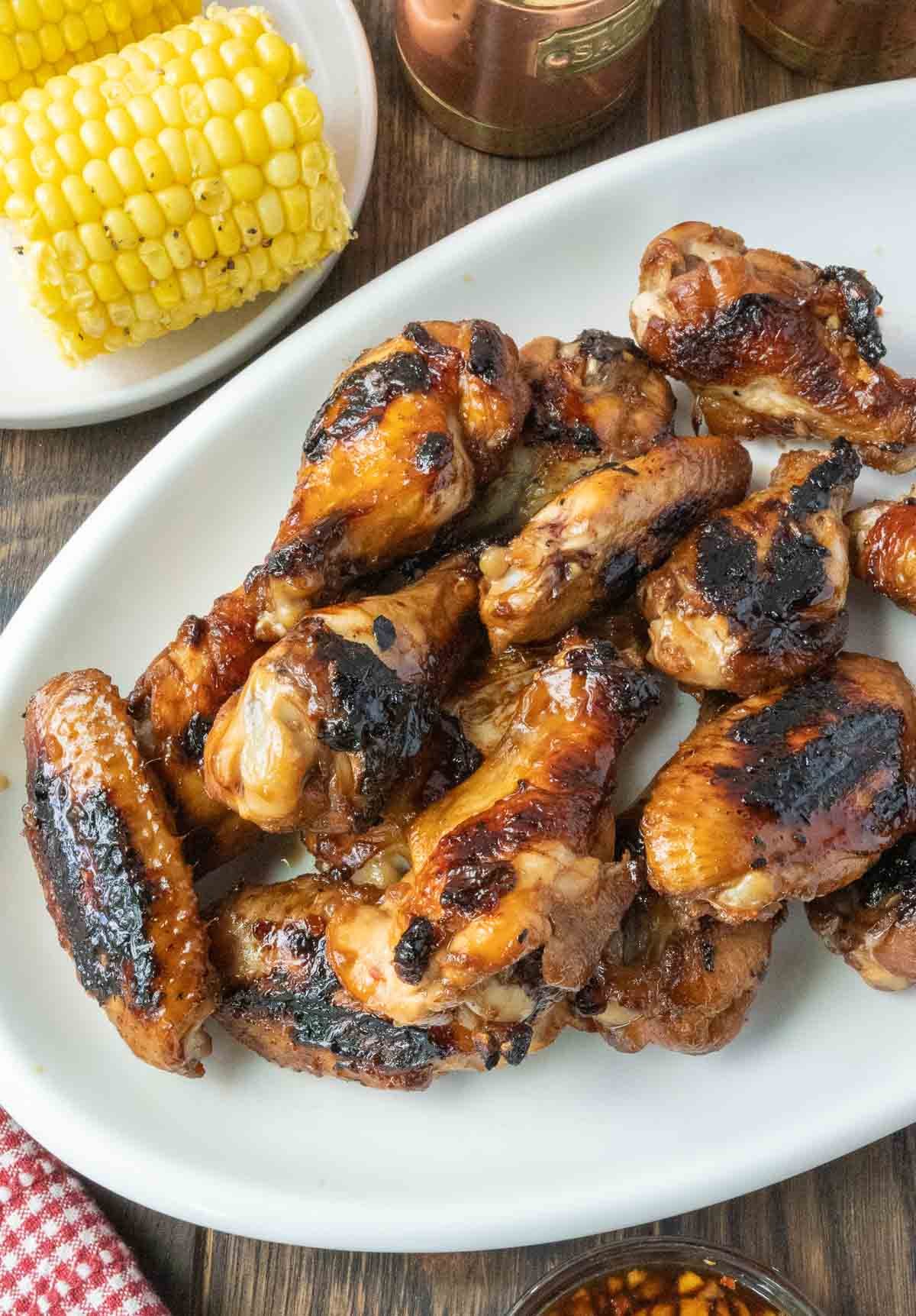 A platter of grilled soy garlic chicken wings.