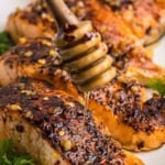 Pinterest graphic featuring hot honey salmon.