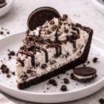 oreo cheesecake slice on a plate.