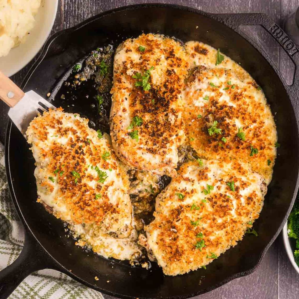 Longhorn steakhouse parmesan chicken in a skillet.
