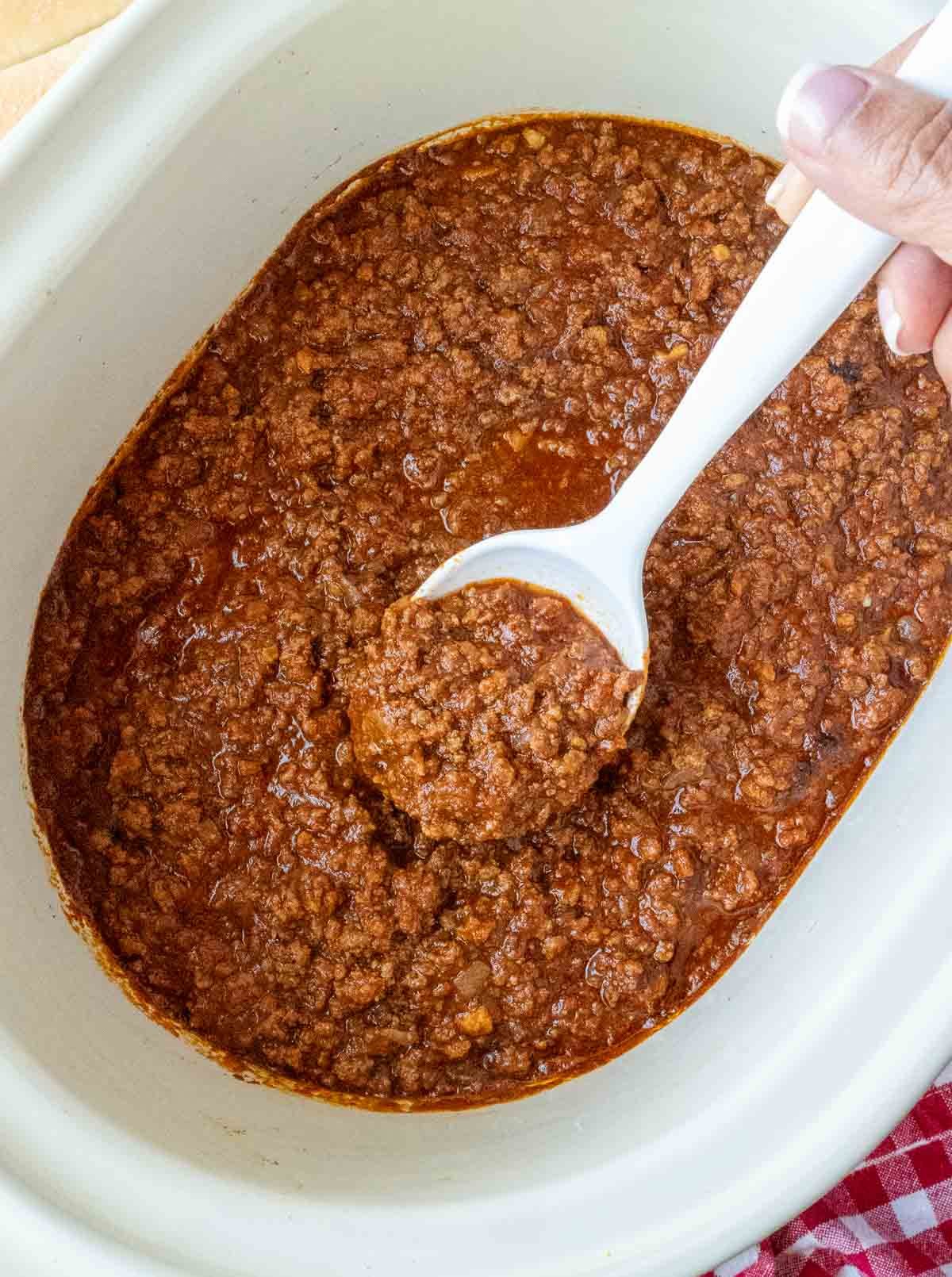 Hot dog chili sauce in a slow cooker.
