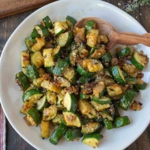 A plate of sauteed zucchini and onions.