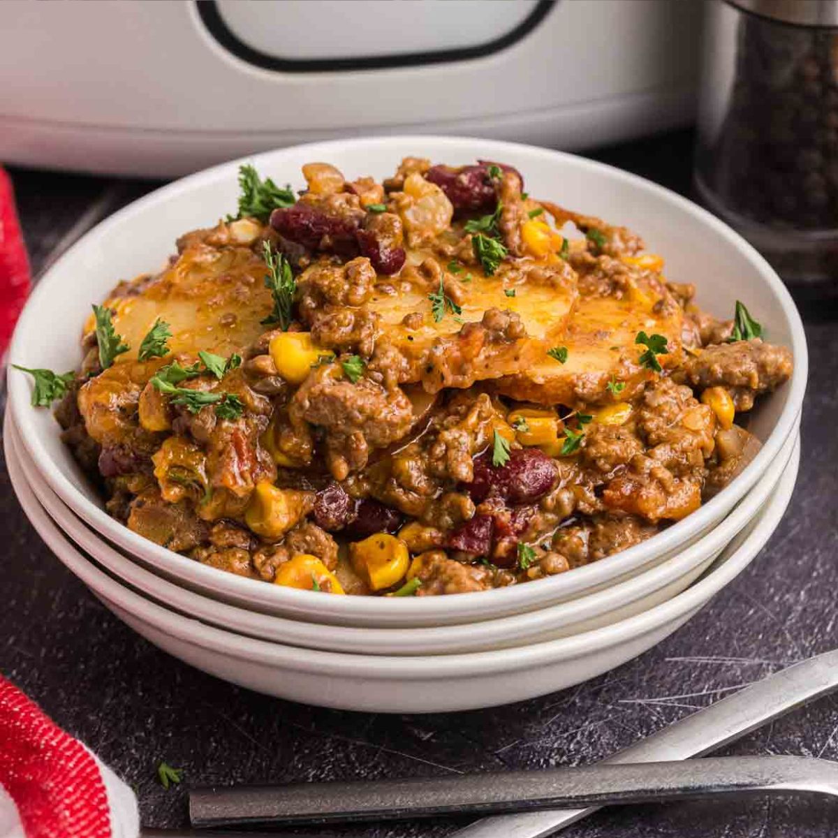 A bowl of slow cooker cowboy casserole.