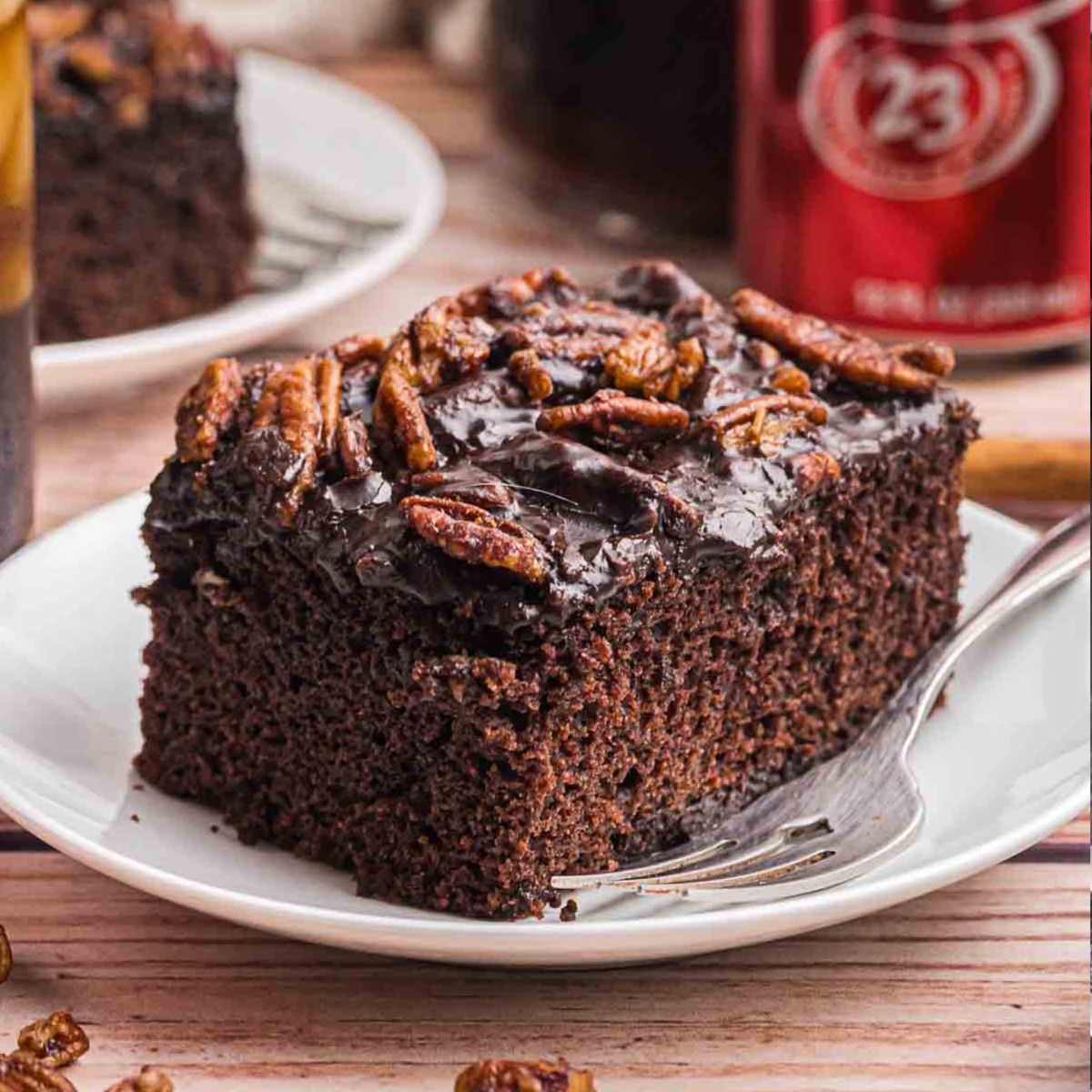 A slice of dr pepper cake on a plate.