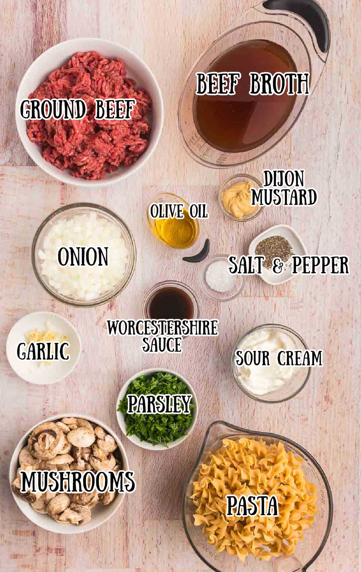 Labeled ingredients for slow cooker ground beef stroganoff.