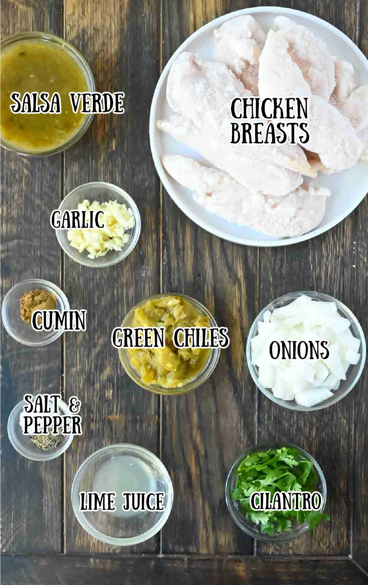 Labeled ingredients for slow cooker salsa verde chicken.