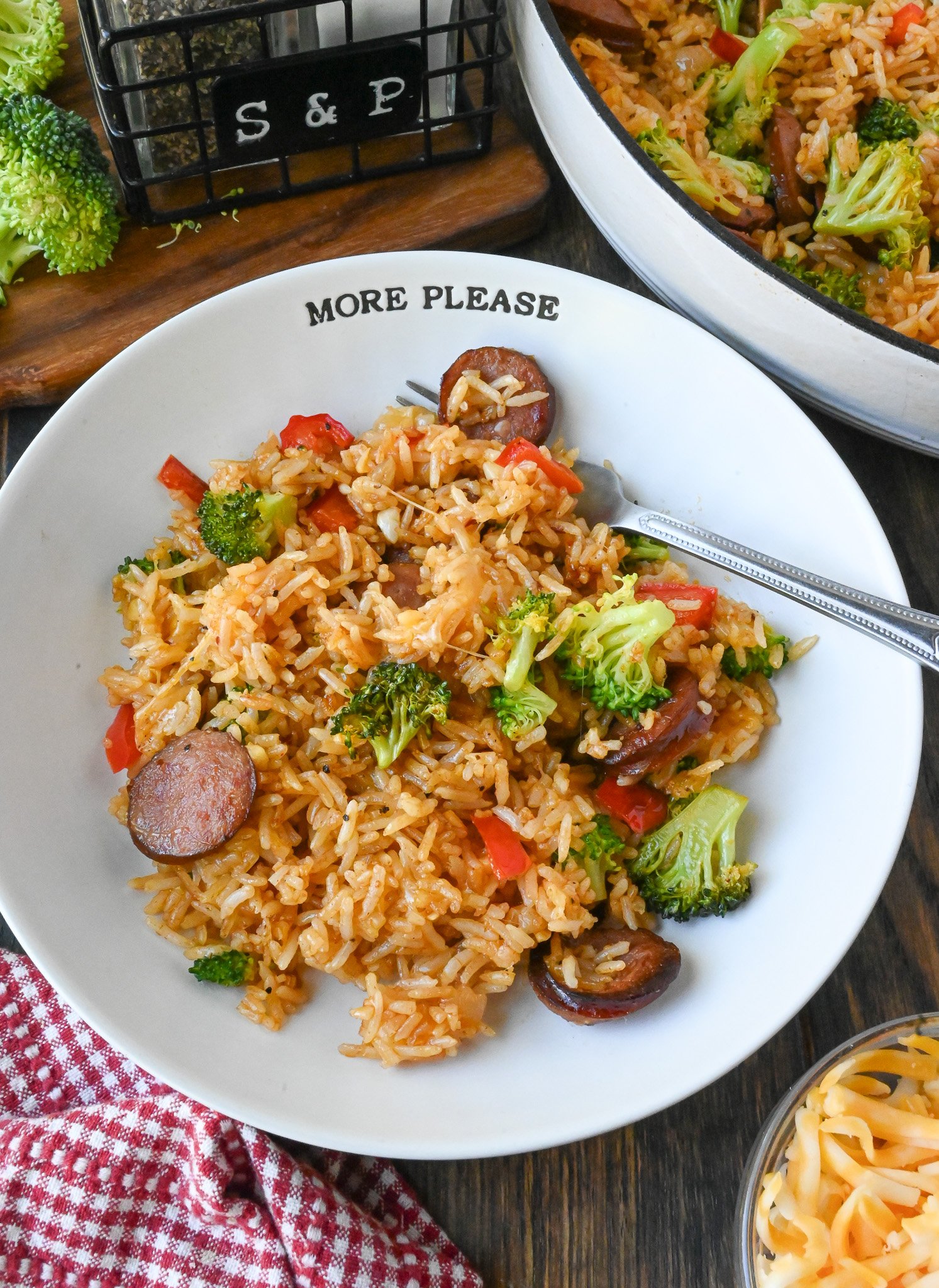 Sausage rice skillet on a plate with a fork.