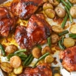 Pinterest graphic featuring BBQ baked chicken potatoes and green beans.
