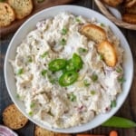 jalapeno artichoke dip in a white bowl.