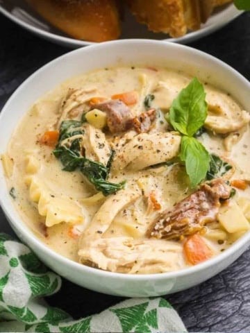 A bowl of white chicken lasagna soup.