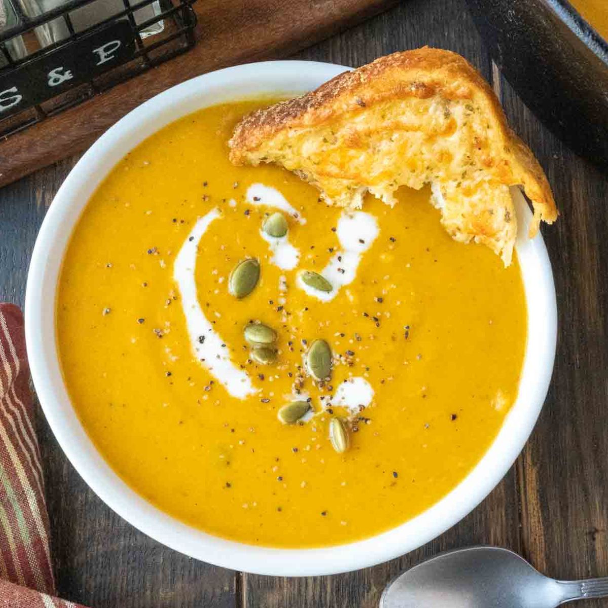 A bowl of panera bread butternut squash soup.