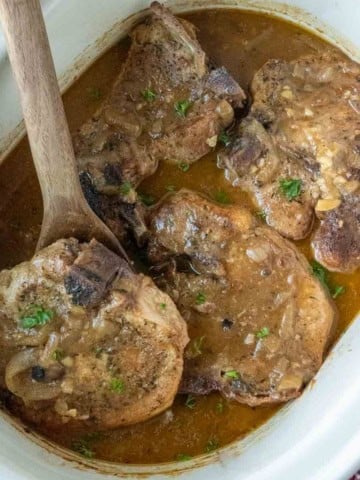 Smothered pork chops in a crock pot.
