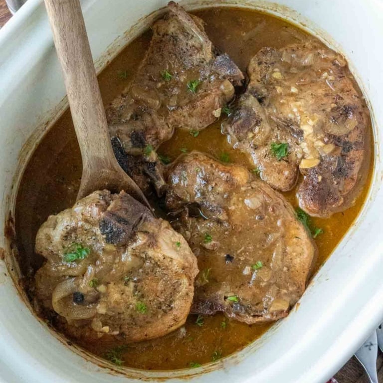 Smothered pork chops in a crock pot.
