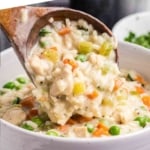 Pinterest graphic featuring creamy chicken and rice soup.