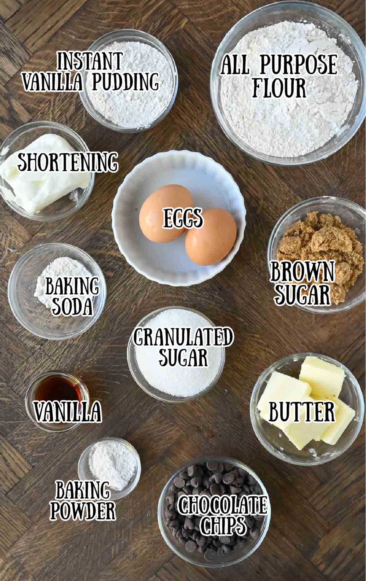 A picture of all the labeled ingredients for these chocolate chip pudding cookies.