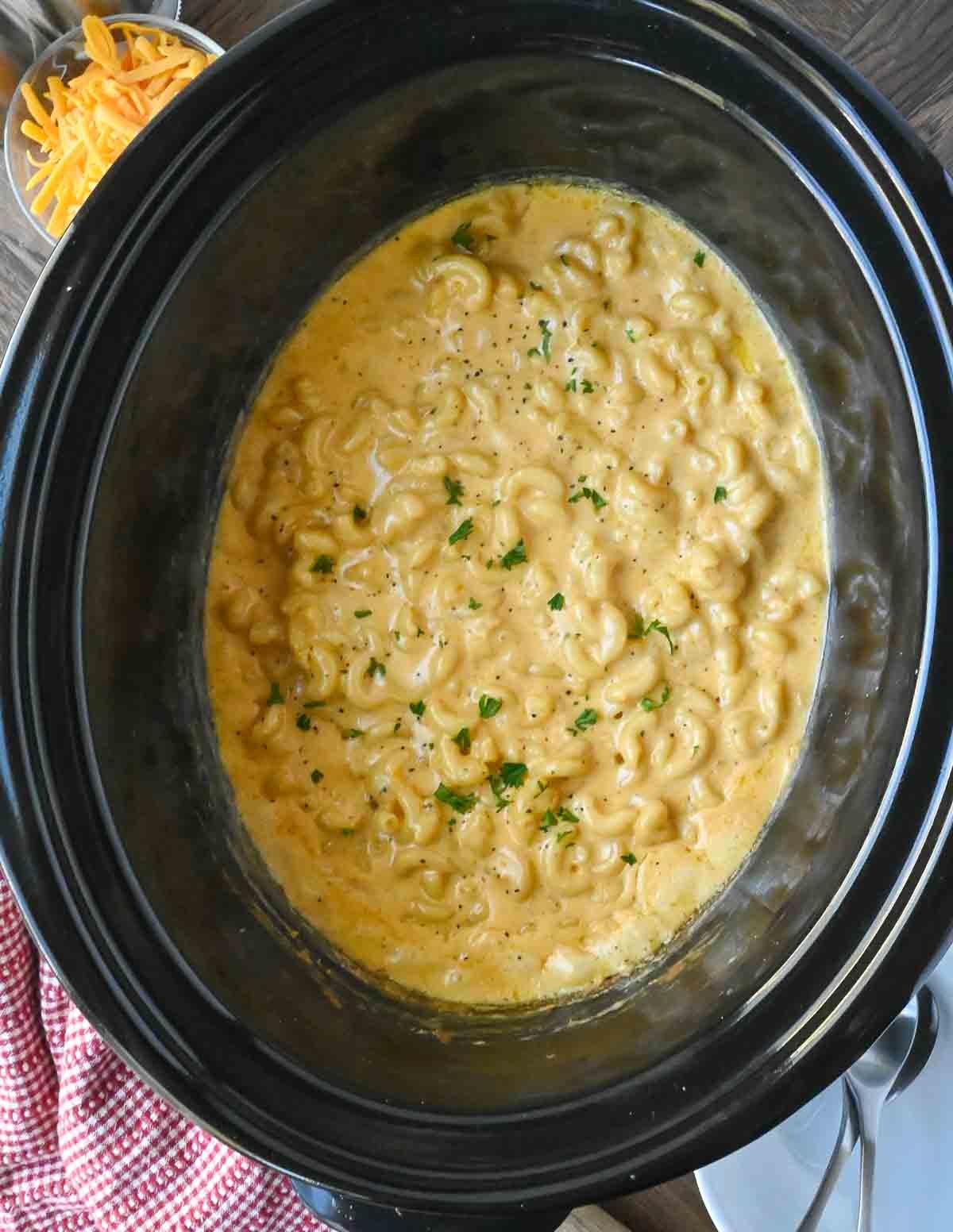 Cheesy mac and cheese in a crockpot.