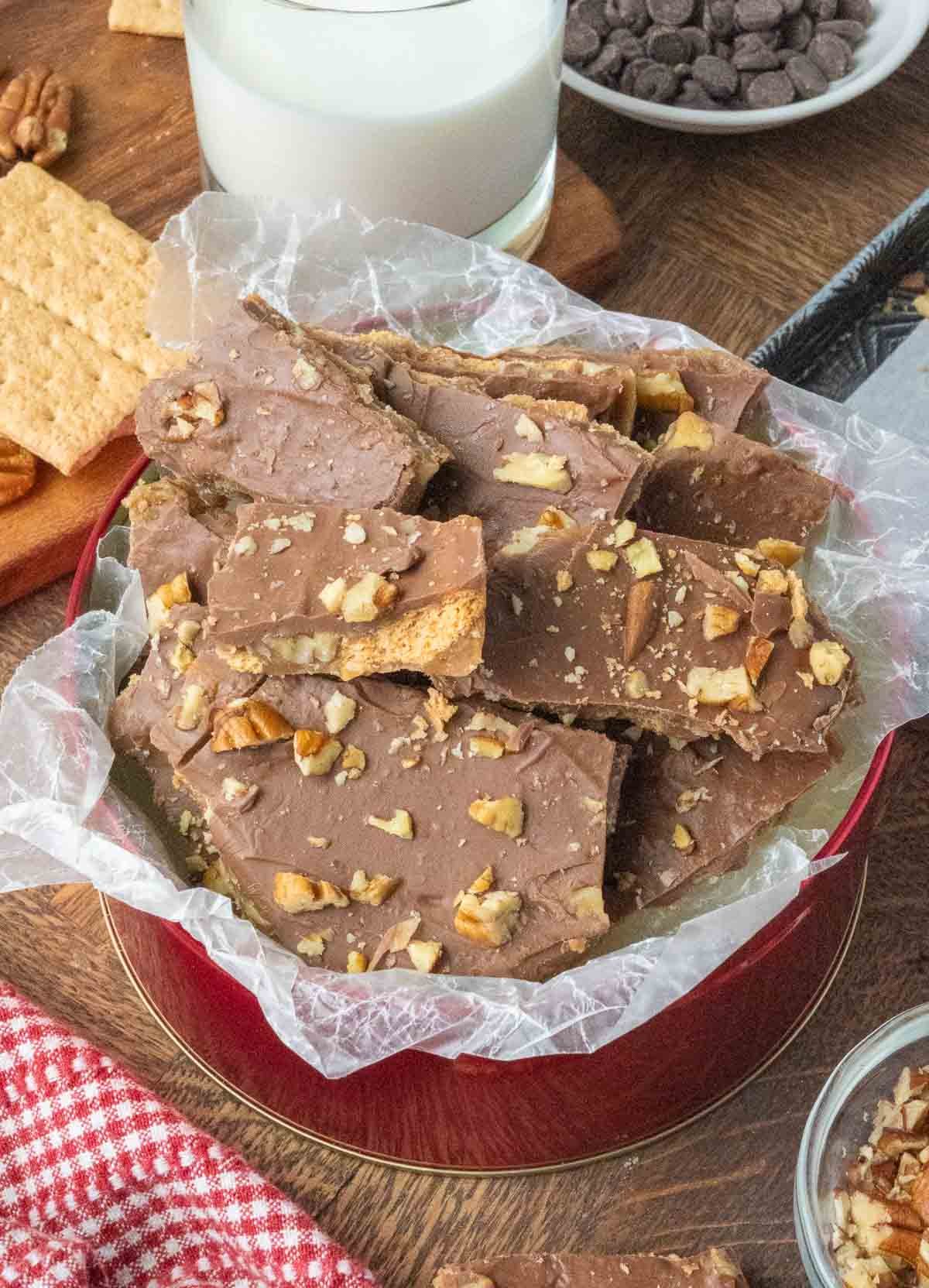Graham cracker toffee in a red gift tin.