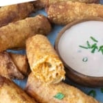 Pinterest graphic featuring buffalo chicken egg rolls.